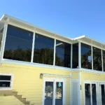 Completed Custom Glass Patio Enclosure with Tinted Windows